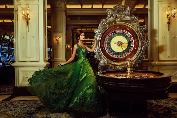A close-up shot of golden coins falling around a spinning roulette wheel, representing immersive casino action at BB444.