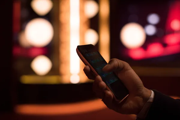 A glowing roulette wheel with cascading chips, symbolizing the engaging live and instant-win games available on BB444.